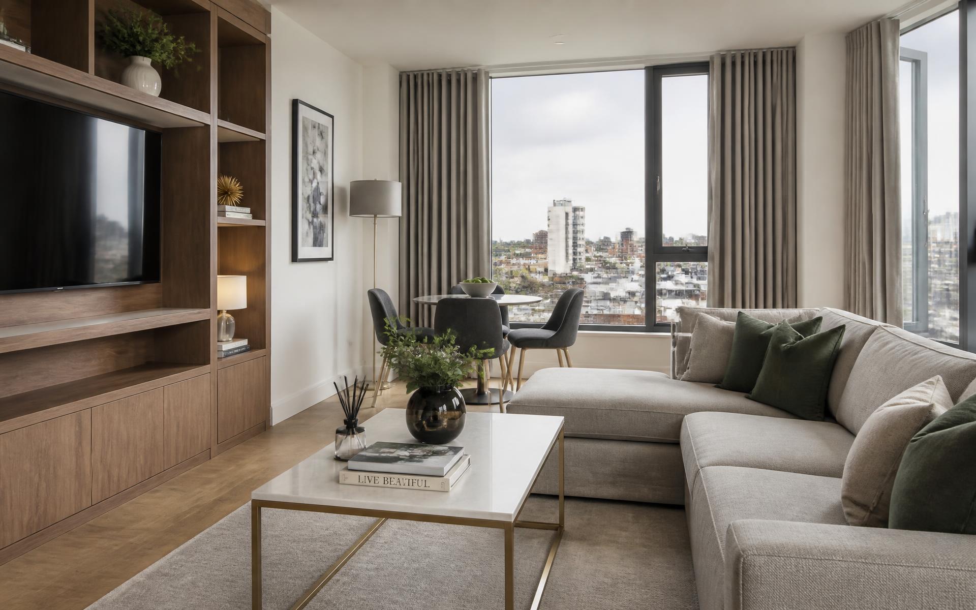 Modern professionally furnished serviced apartment living room with natural daylight